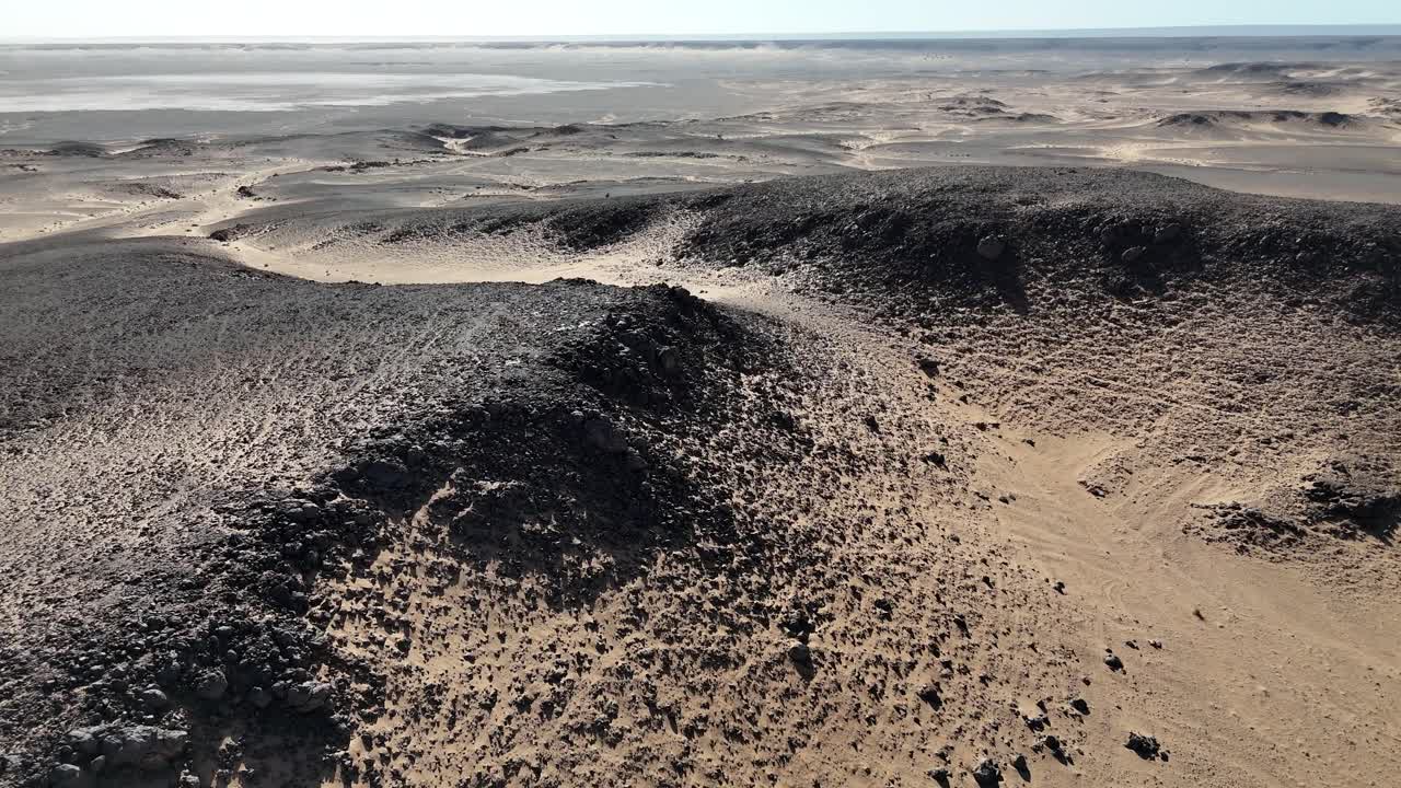 Drone aerial footage of the Eye of the Sahara in Mauritania, also called the Richat Structure. Iconic circular geological formation in the vast desert landscape