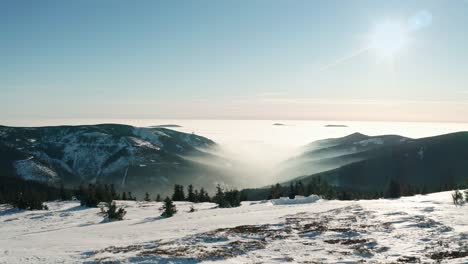 winter czech mountain landscape covered with snow from drone