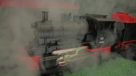 toy steam train in action