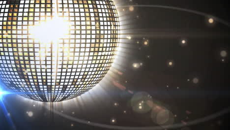 rotating disco ball with light reflections and glowing particles animation