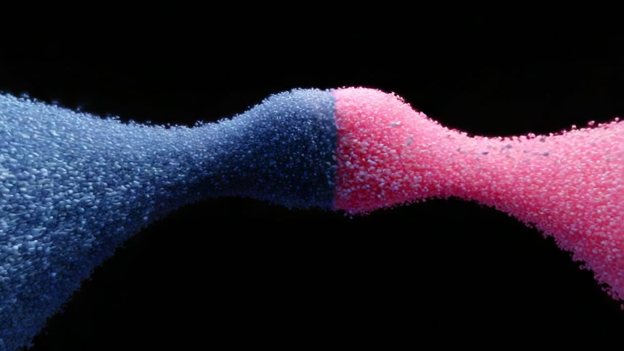 Dynamic Interaction Between Colorful Particles: An Artistic Representation of the Fusion and Conflict Between Blue and Pink Elements in a Dark Background