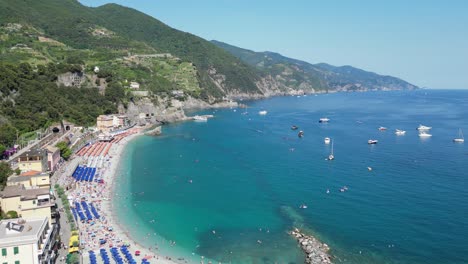 monterosso al mare beach in cinque terre, vernazza, la spezia, liguria, italy - aerial 4k
