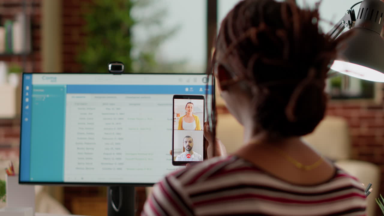 Woman using smartphone for telemedicine video call