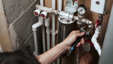 plumber fixing water tubes