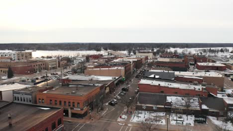 empty main street in united states during pandemic lockdown in winter, stevens point wisconsin