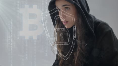 Security-padlock,-Bitcoin-symbol-and-binary-coding-against-female-hacker-using-laptop