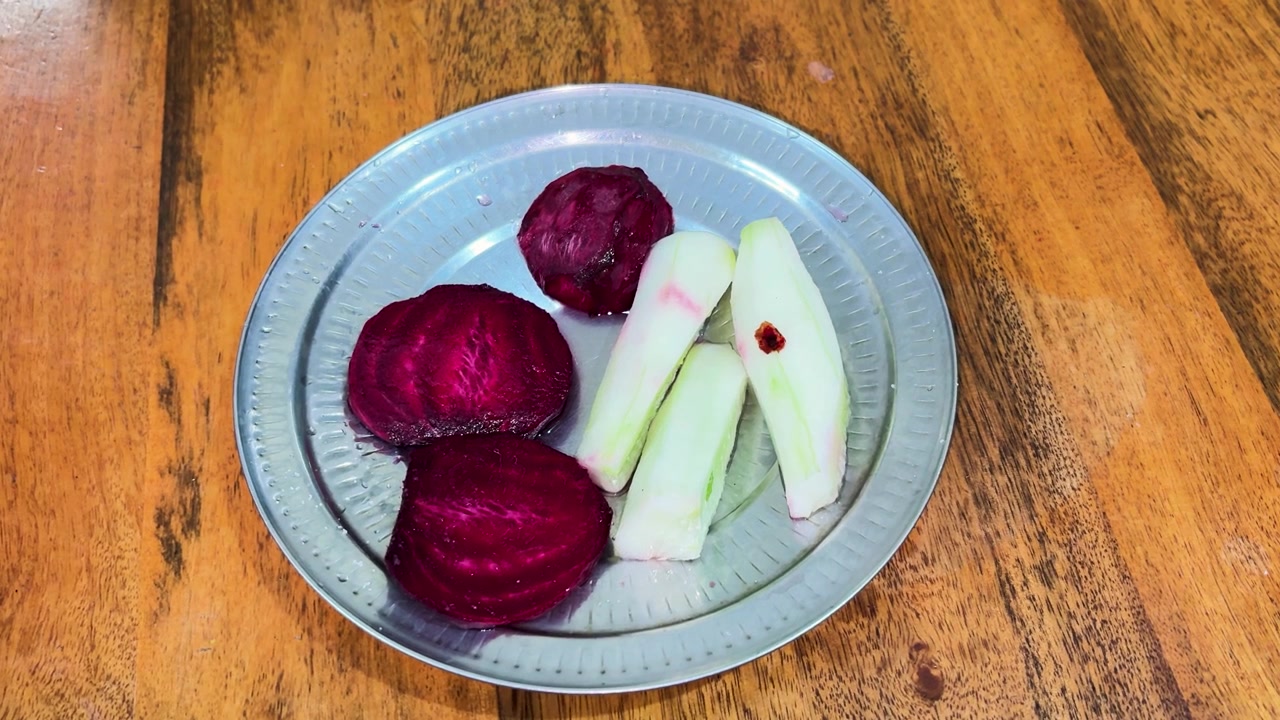 Fresh Beetroot and Cucumber Salad Served on a Plate