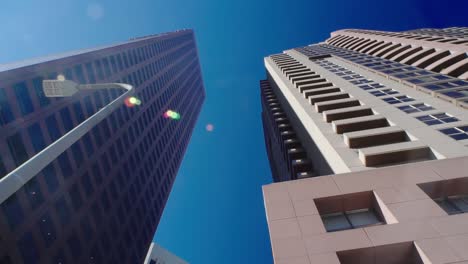 glass facade skyscrapers, business district. skyscraper buildings street in downtown los angeles