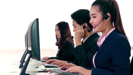 business people wearing headset working in office