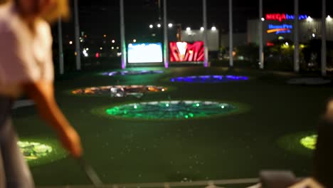 golfing at night with illuminated targets