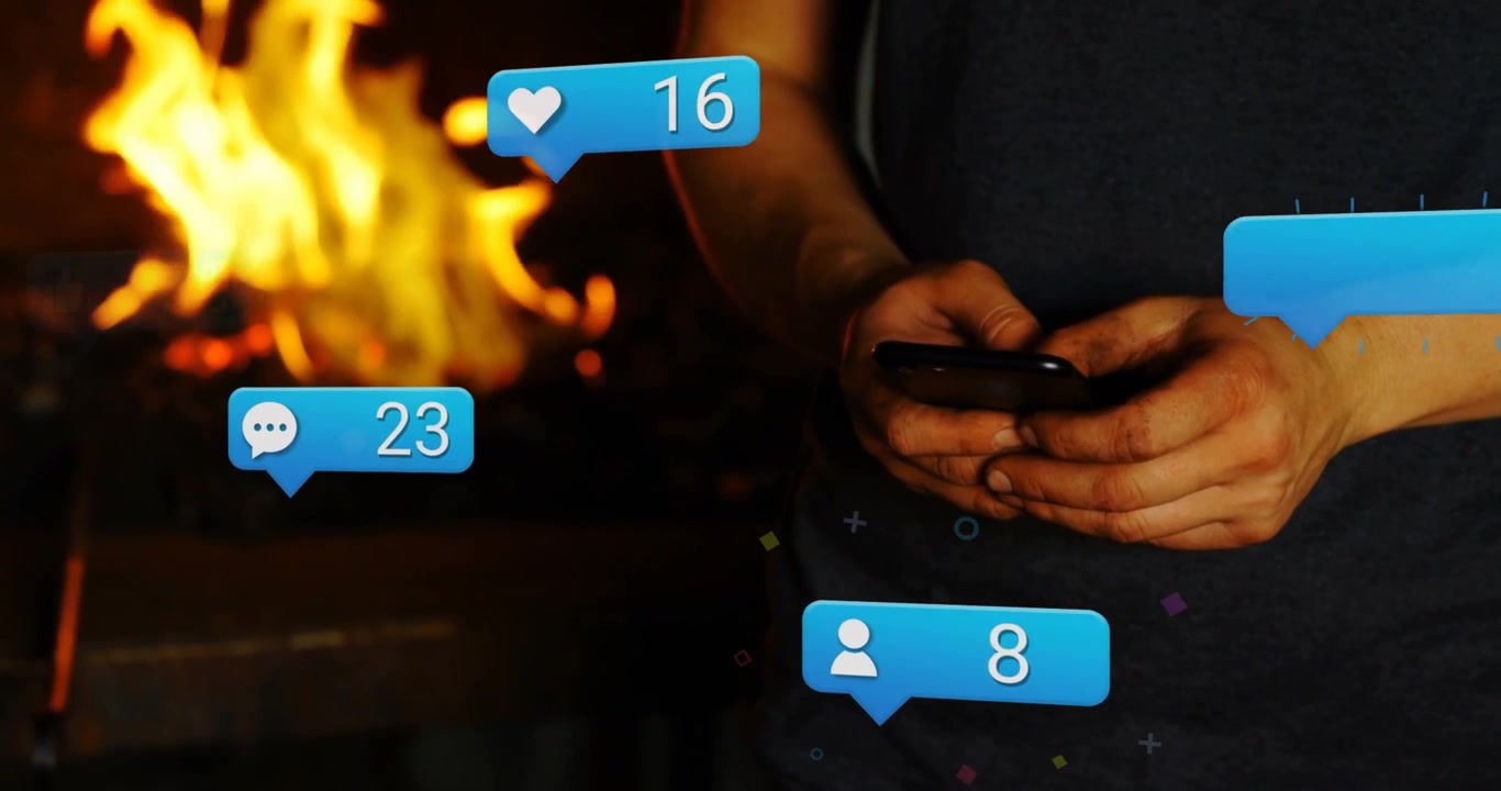 Man tapping phone by fire causing social icons floating around hands updating counts for engagement