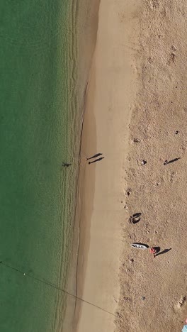 Emerald-green-beaches-in-Huatulco,-Mexico,-aerial-vertical-view