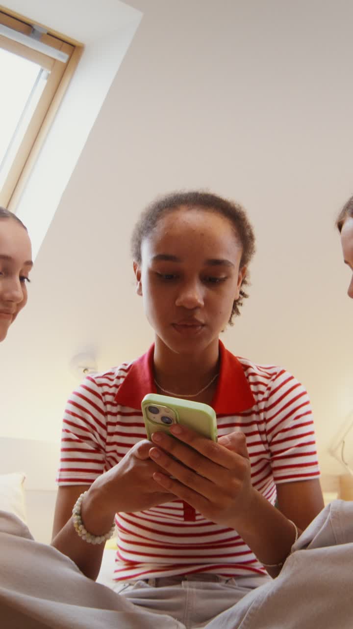 Friends Looking at a Smartphone