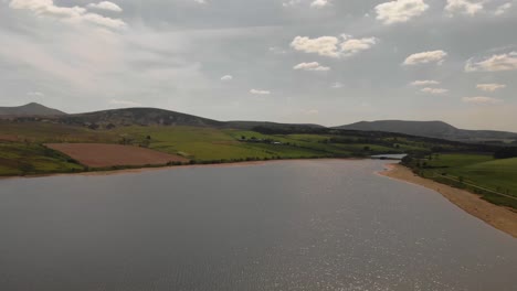 Aerial-view-of-Threipmuir-Reservoir-in-the-Pentland-Hills-in-Scotland