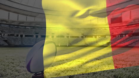 animation of waving flag of belgium over stadium with rugby ball