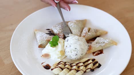 savoring banana samosa dessert with ice cream