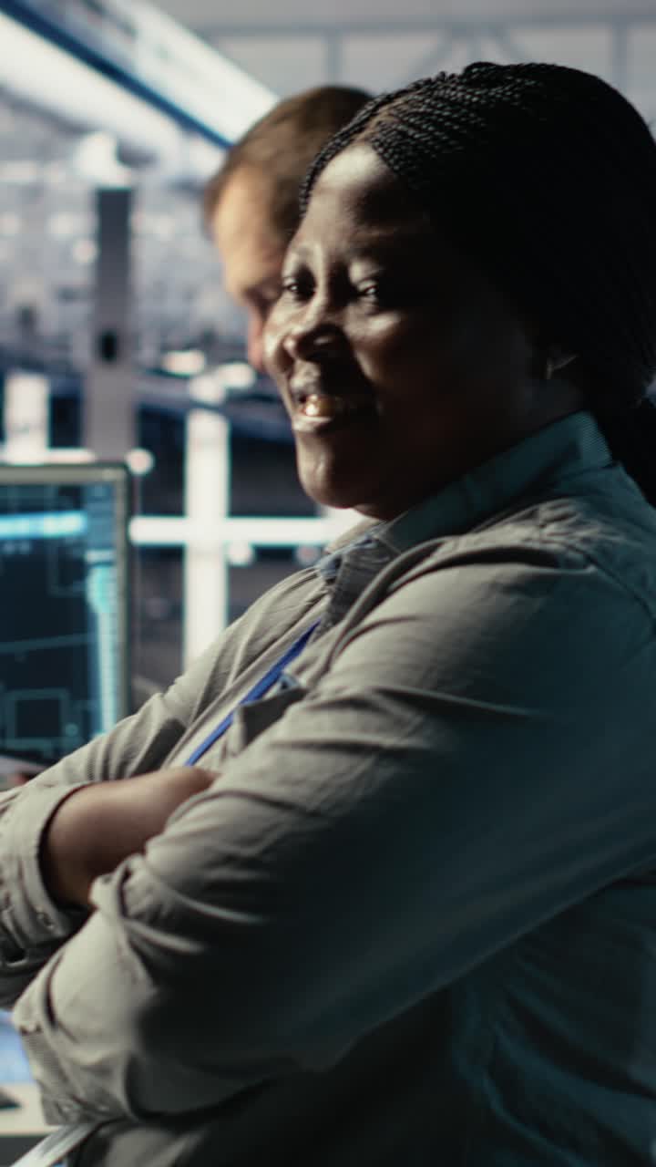 Vertical Video Portrait Of Smiling Data Center Manager Working To Improve Ai Rigs