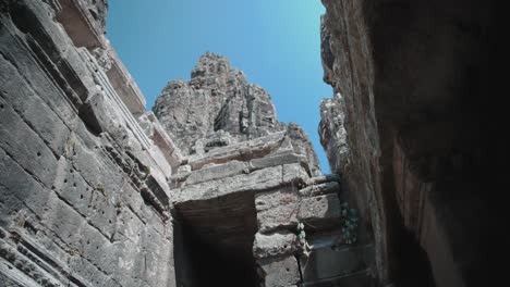 stone structures at cambodian buddhist pyramid temple in bayon, angkor thom, siem reap, cambodia