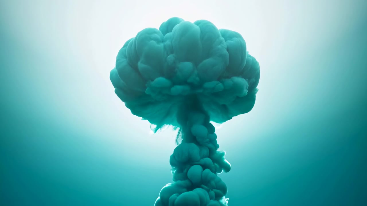 Turquoise smoke or ink plume expands into broad rounded cloud shape with dense organic texture and narrow stem below, set against bright backlit aqua background, soft glow and high contrast silhouette