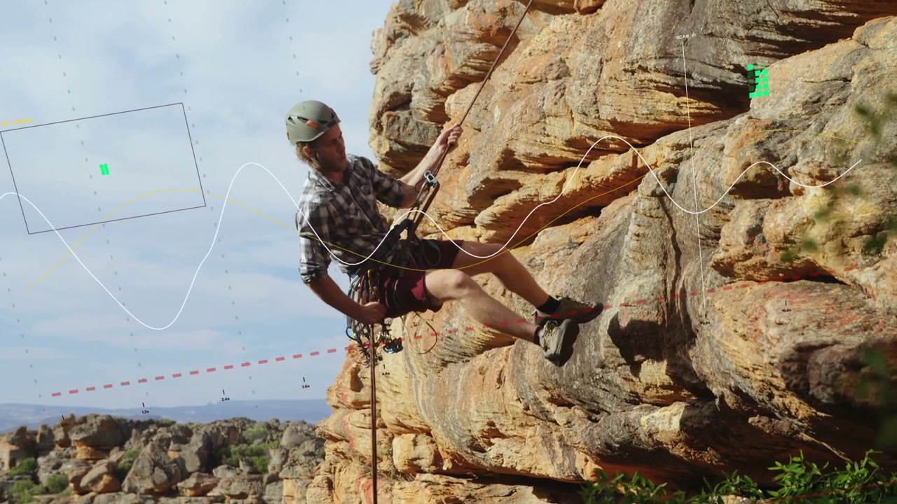 Climber pulling rope to rappel, rappelling rock face with dashed red marking footholds for training