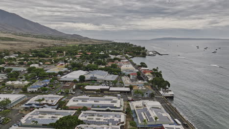 lahaina maui hawaii aerial v3 establishing shot drone flyover town center along the coastline with restaurants and shops along front street on an overcast day - shot with mavic 3 cine - december 2022