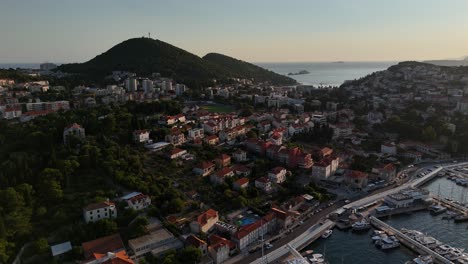 port gruz dubrovnik croatia drone aerial view of the city port harbour town evening dusk balkan country on the adriatic sea franjo tuđman bridge