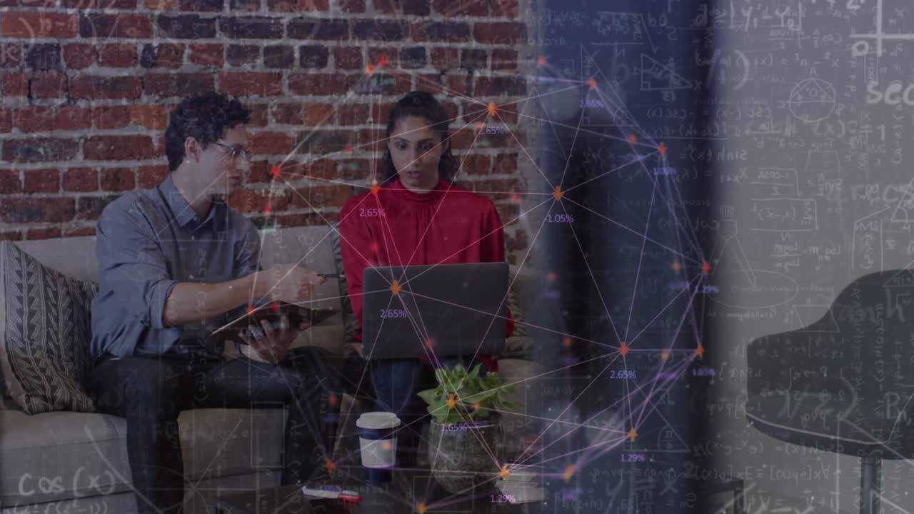 Animation of networks of connections over business people using laptop