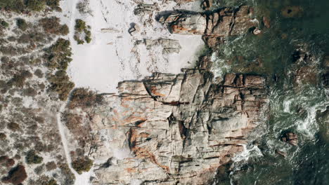 Top-down-View-Of-Rocky-Coast-At-Britannia-Beach,-St