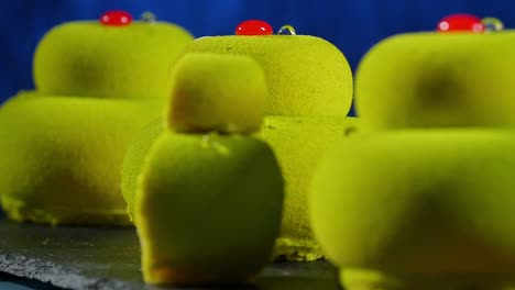 lime green mousse cakes with red glaze