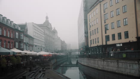 aarhus city centre at foggy winter day