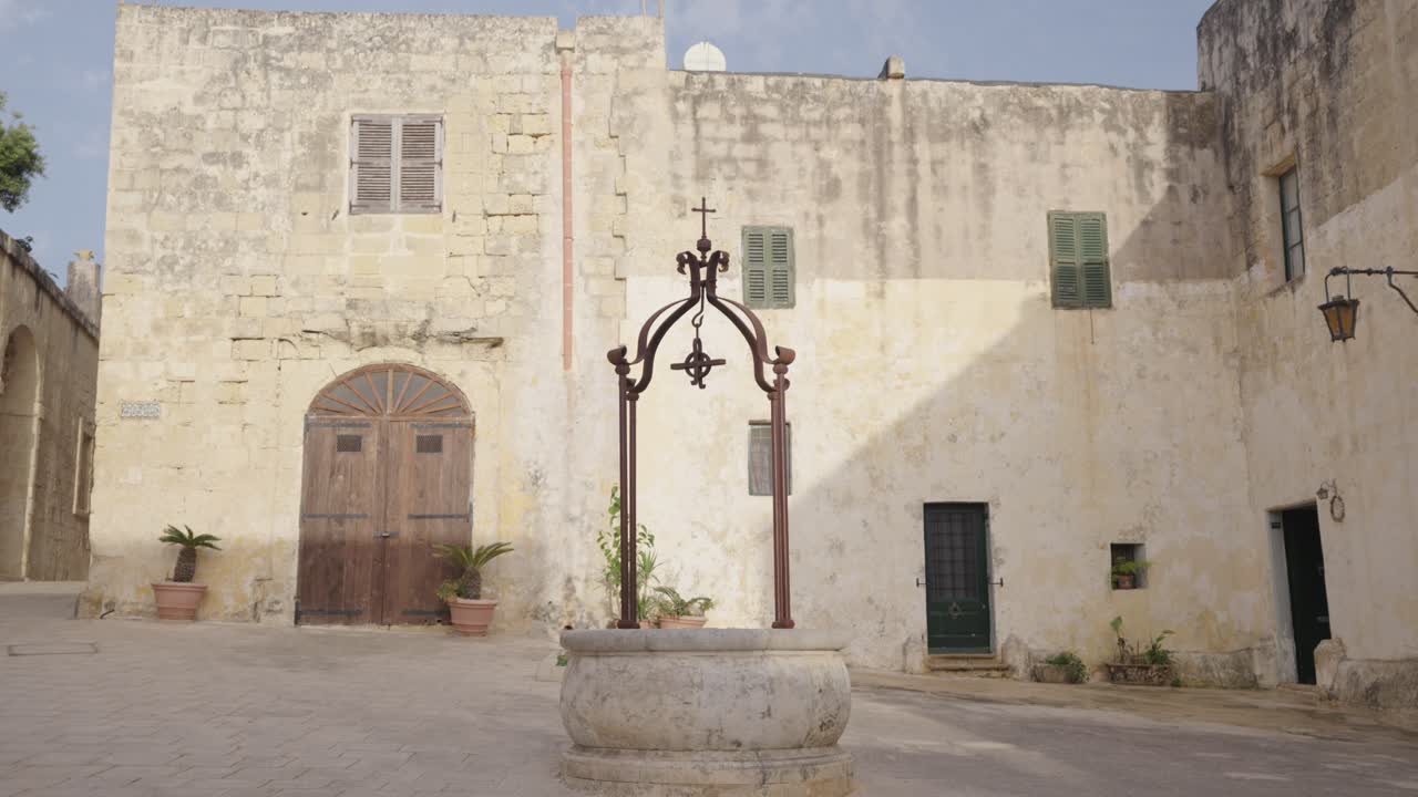 Old town well in Mesquita square, Malta - Game of Thrones filming location