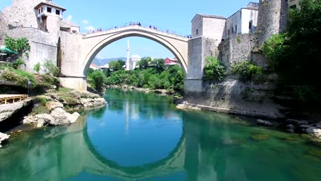 flying towards famous bridge in mostar, bosnia and herzegovina