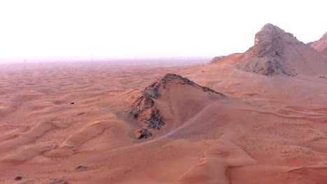 4k drone footage, aerial view of fossil rocks plateau in meliha desert with sand ripples, geological landscape of the sphinx in sand dunes desert in the united arab emirates, drone videos