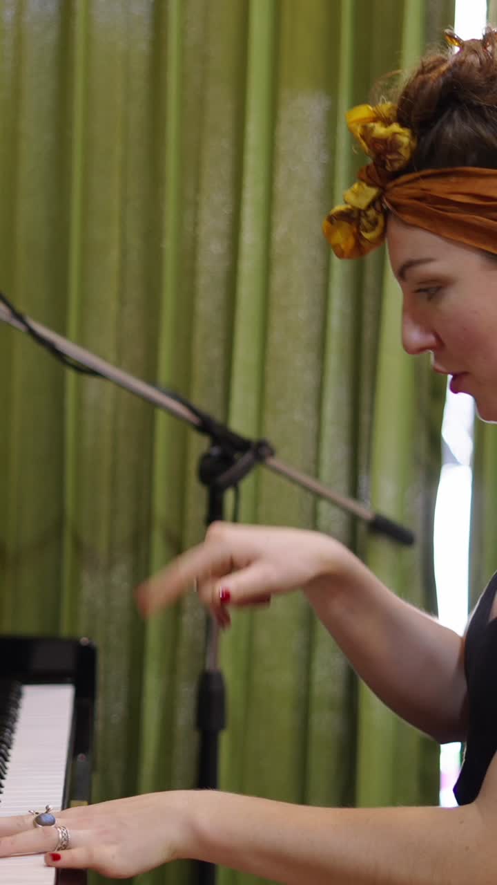 Woman playing piano and singing