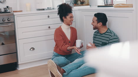 Coffee,-laughing-and-a-couple-on-the-kitchen-floor