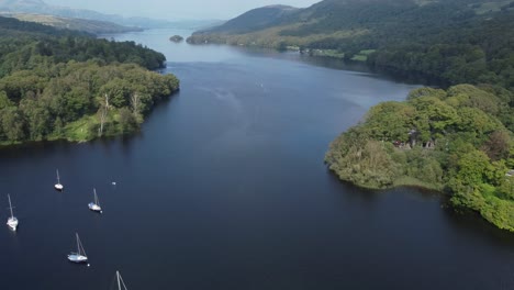 drone footage showing coniston lake in the lake district, cumbria, uk and looking north from the south of the lake