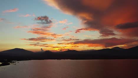 drone shot of a lake in patzcuaro at sunset