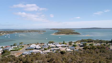 aerial of scenic coffin bay holiday homes and beautiful turquoise ocean, eyre peninsula, south australia