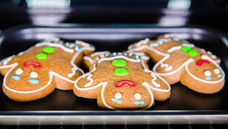 baking gingerbread man in the oven. cooking in the oven.