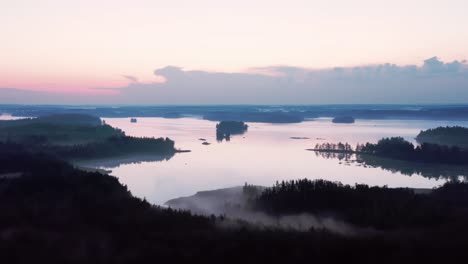 drone footage of sunset over a lake