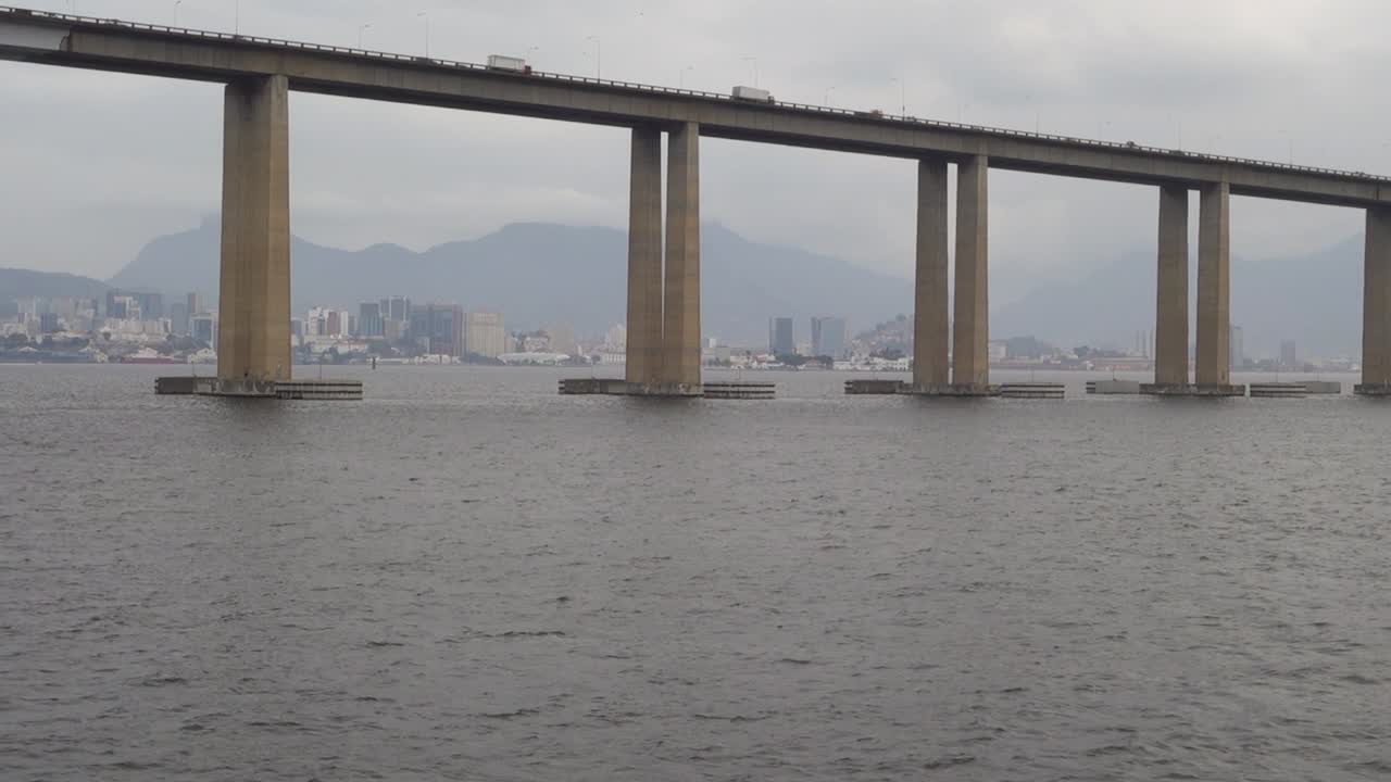 View Of Traffic At Rio Niteroi Bridge Cross Guanabara Bay In Brazil. Low Angle