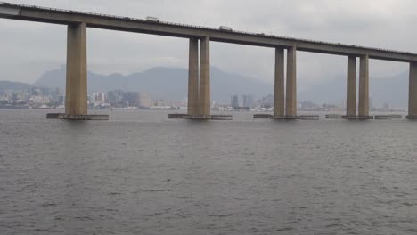 view of traffic at rio niteroi bridge cross guanabara bay in brazil. low angle