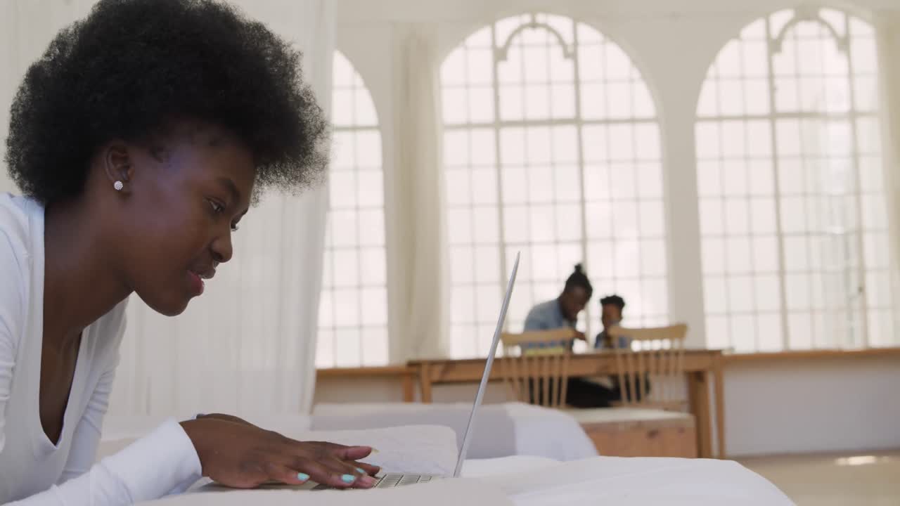 Woman using a laptop at home