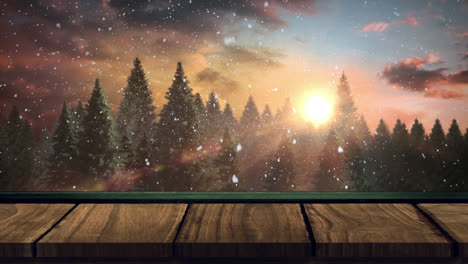 digital composition of snow falling over wooden surface against trees and sun in the sky