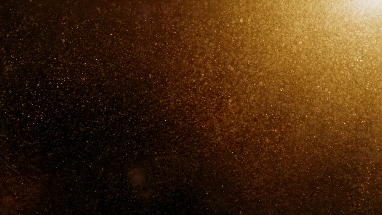 Projecting warm golden beam revealing suspended dust particles drifting slowly in dim interior haze