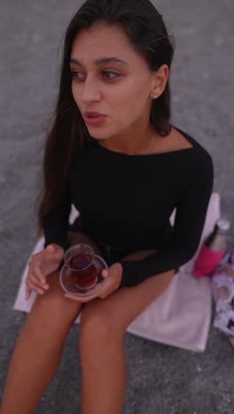 young woman enjoying a cup of tea outdoors