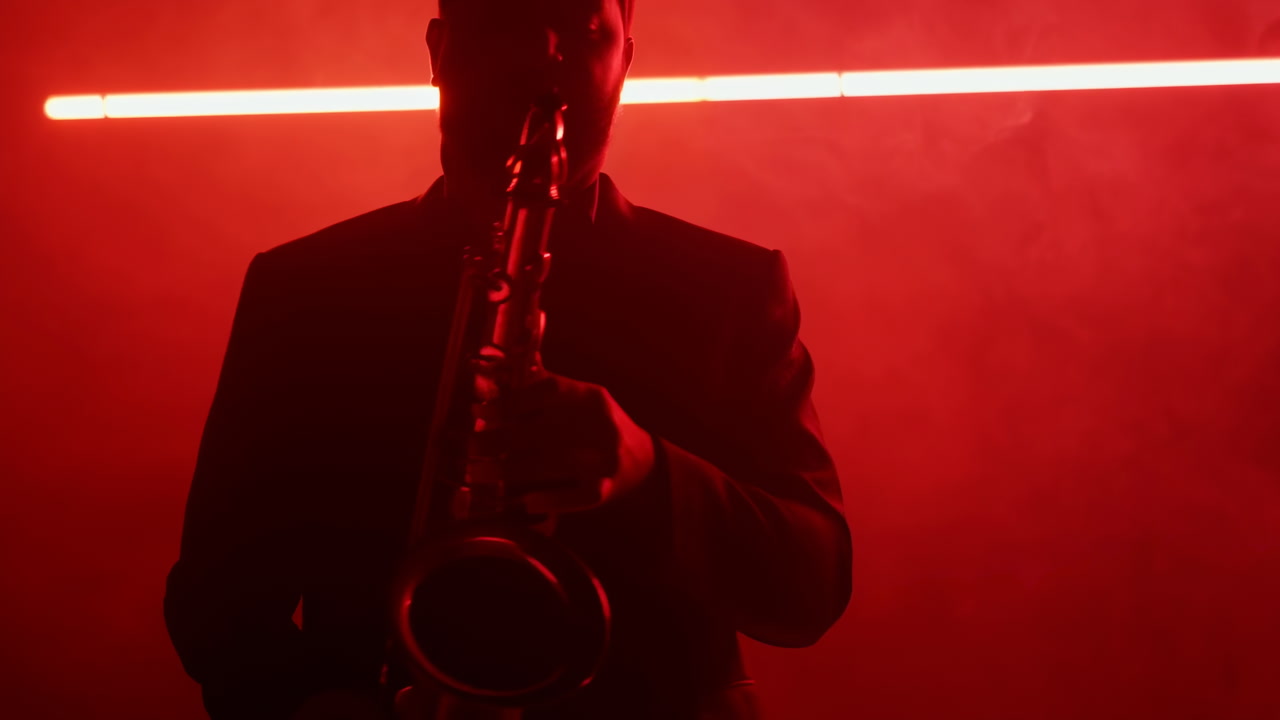Silhouette Saxophonist Under Red Neon Light Smoky Club Atmosphere With Moody Backlight And Horizontal LED Bar