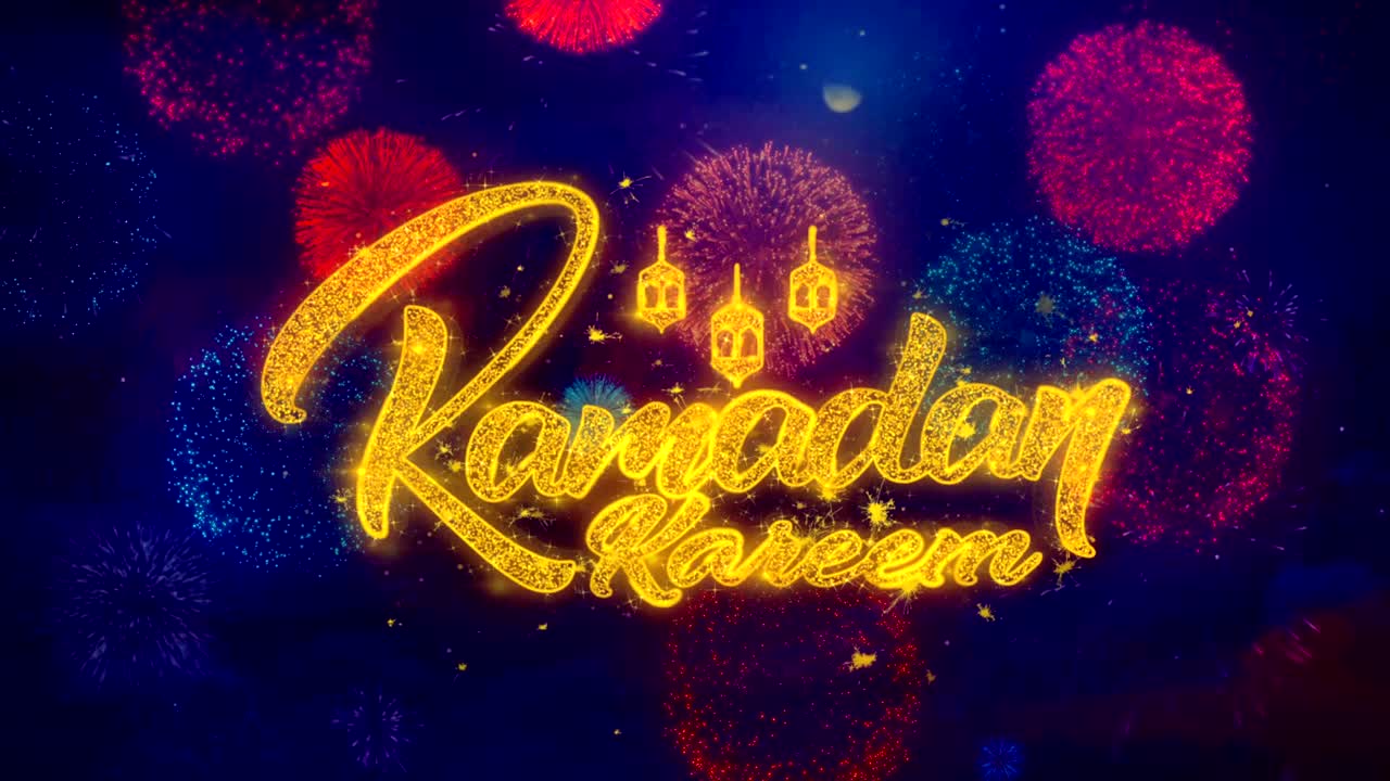 il testo del desiderio di ramadan kareem sulle particelle colorate dell'esplosione dei fuochi d'artificio.