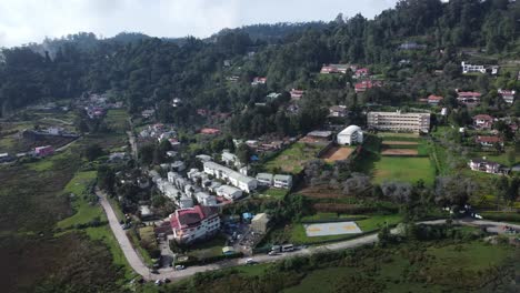 panoramic aerial view of kodaikanal town in palani hills surrounding forests, tamil nadu, india