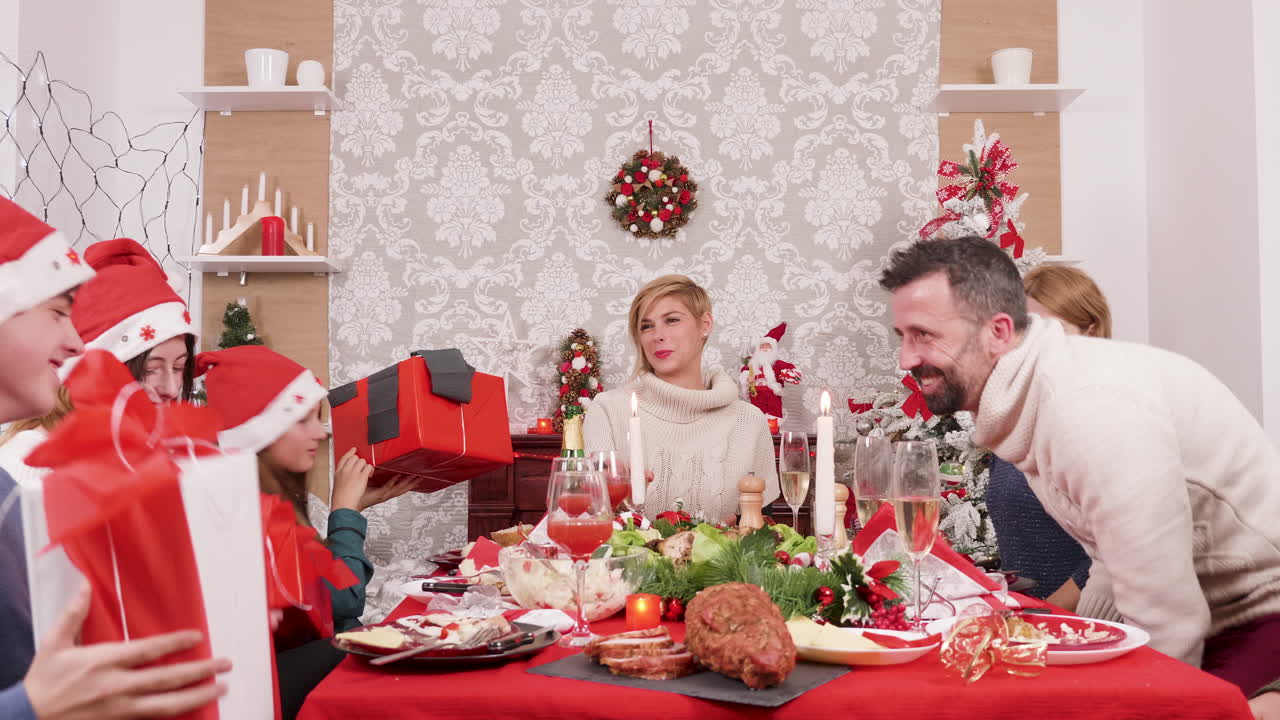 Christmas family gathering with gifts and dinner